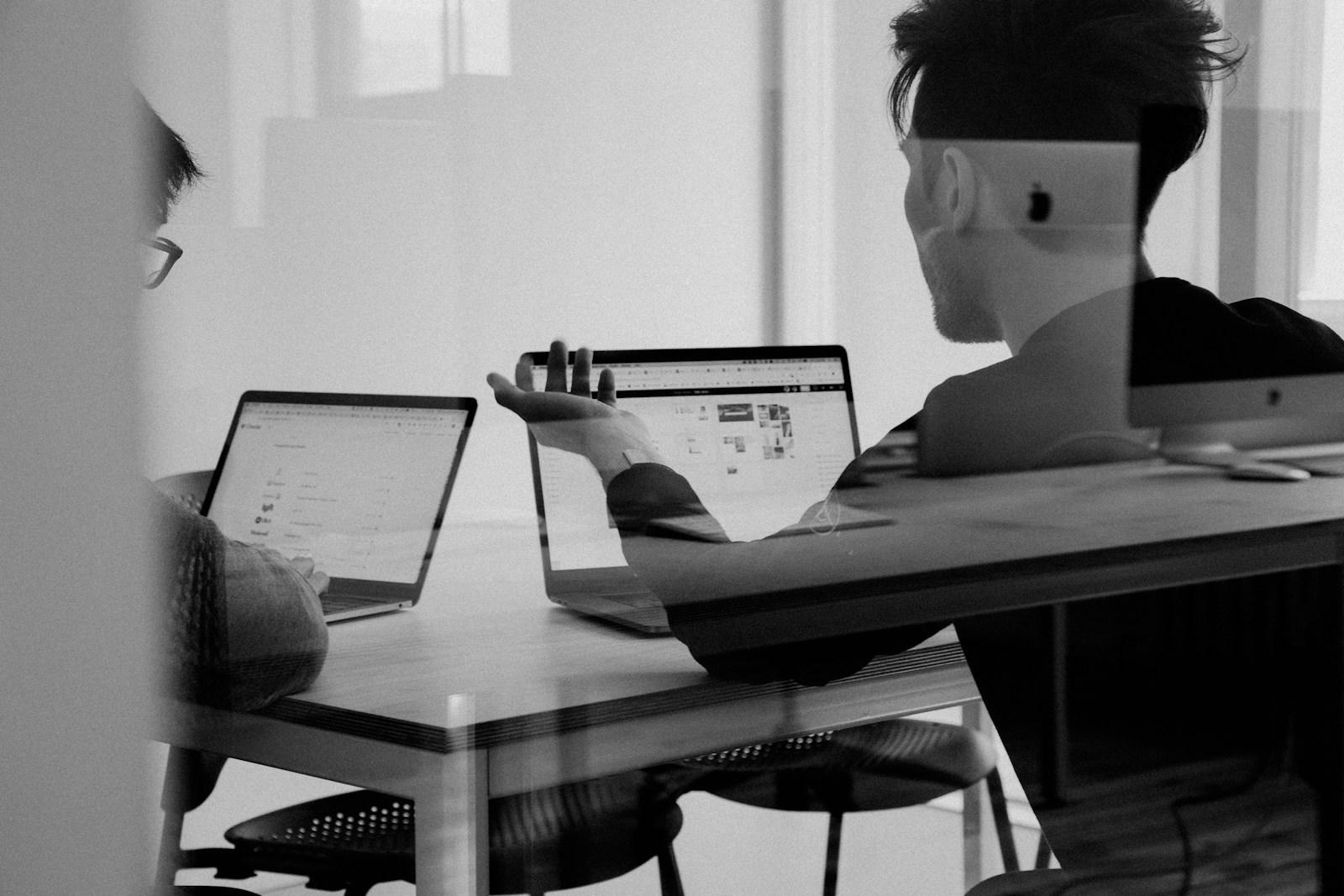 Client review session walking through lead scoring dashboard with brokerage operations lead